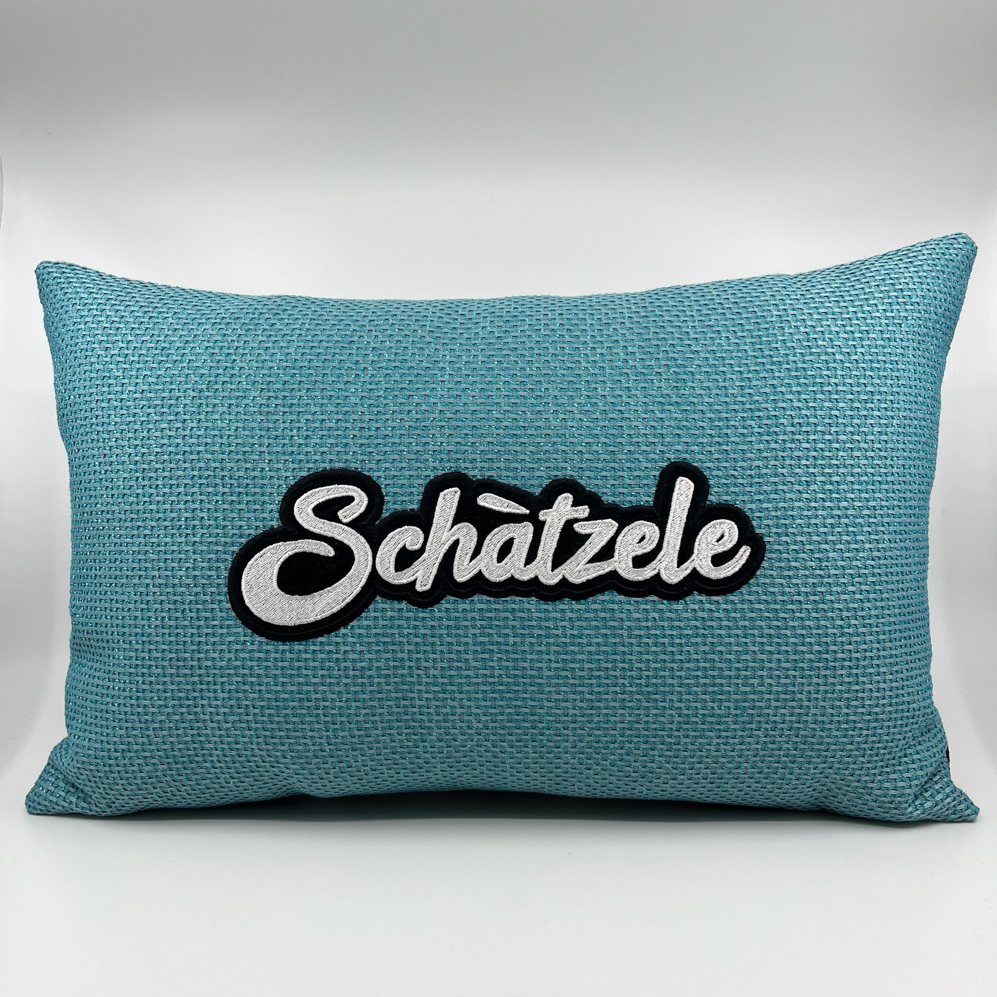 Coussin Schàtzele turquoise