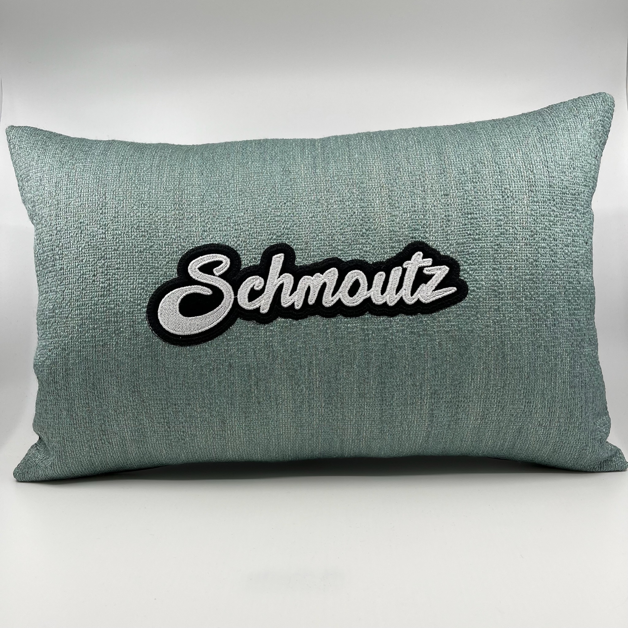 Coussin Schmoutz, toile vert d’eau