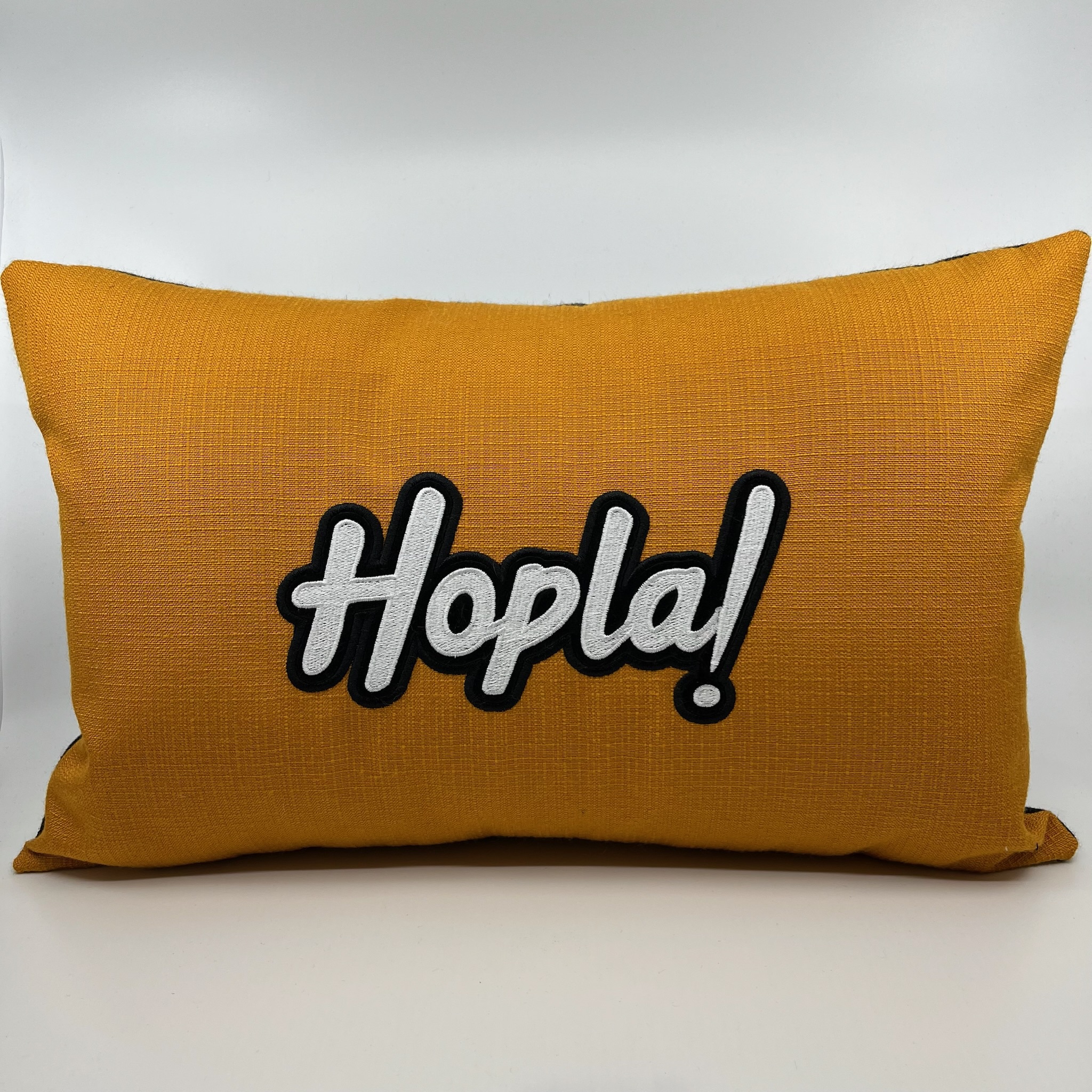 Coussin Hopla !, toile Ocre jaune