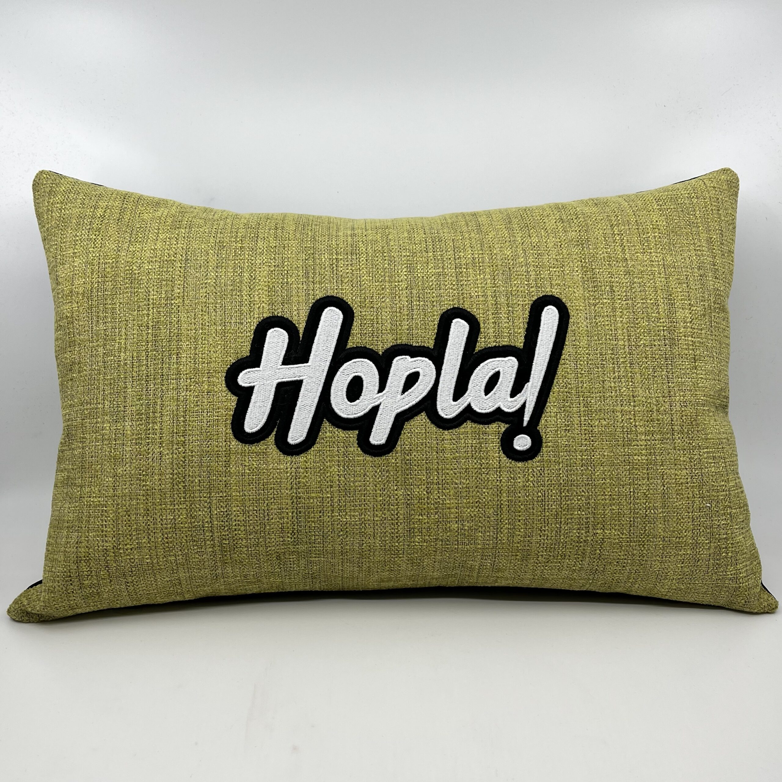 Coussin Hopla !,
Velours vert.