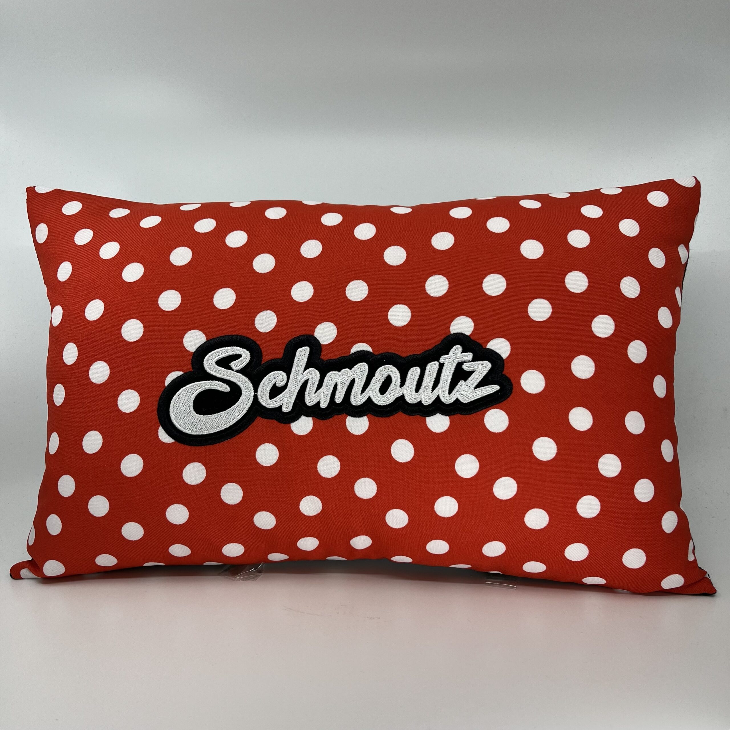 Coussin Schmoutz, pois blancs sur fond rouge
