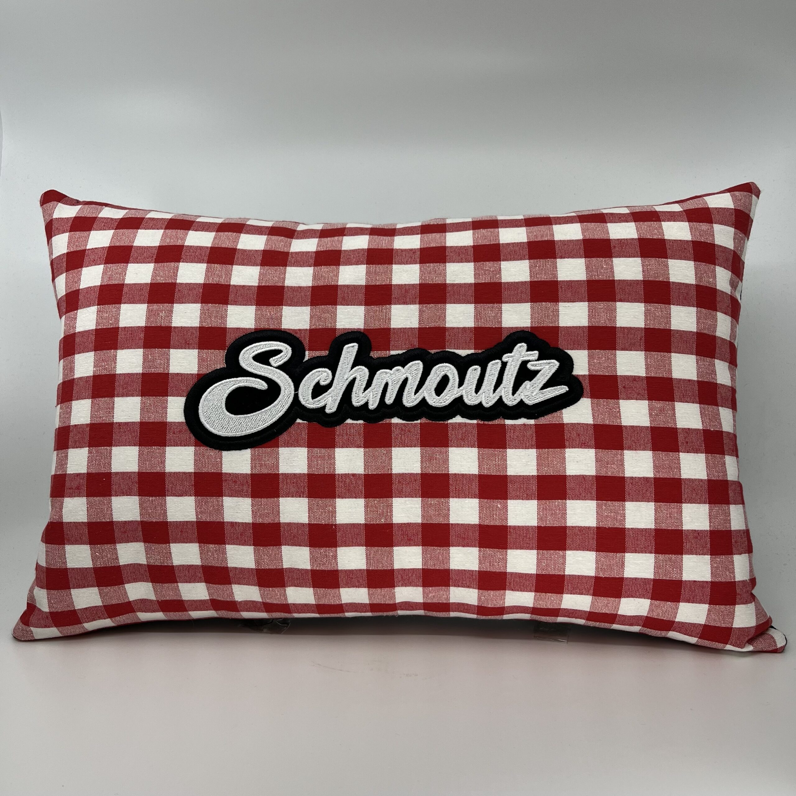 Coussin Schmoutz, carreaux rouges et blancs