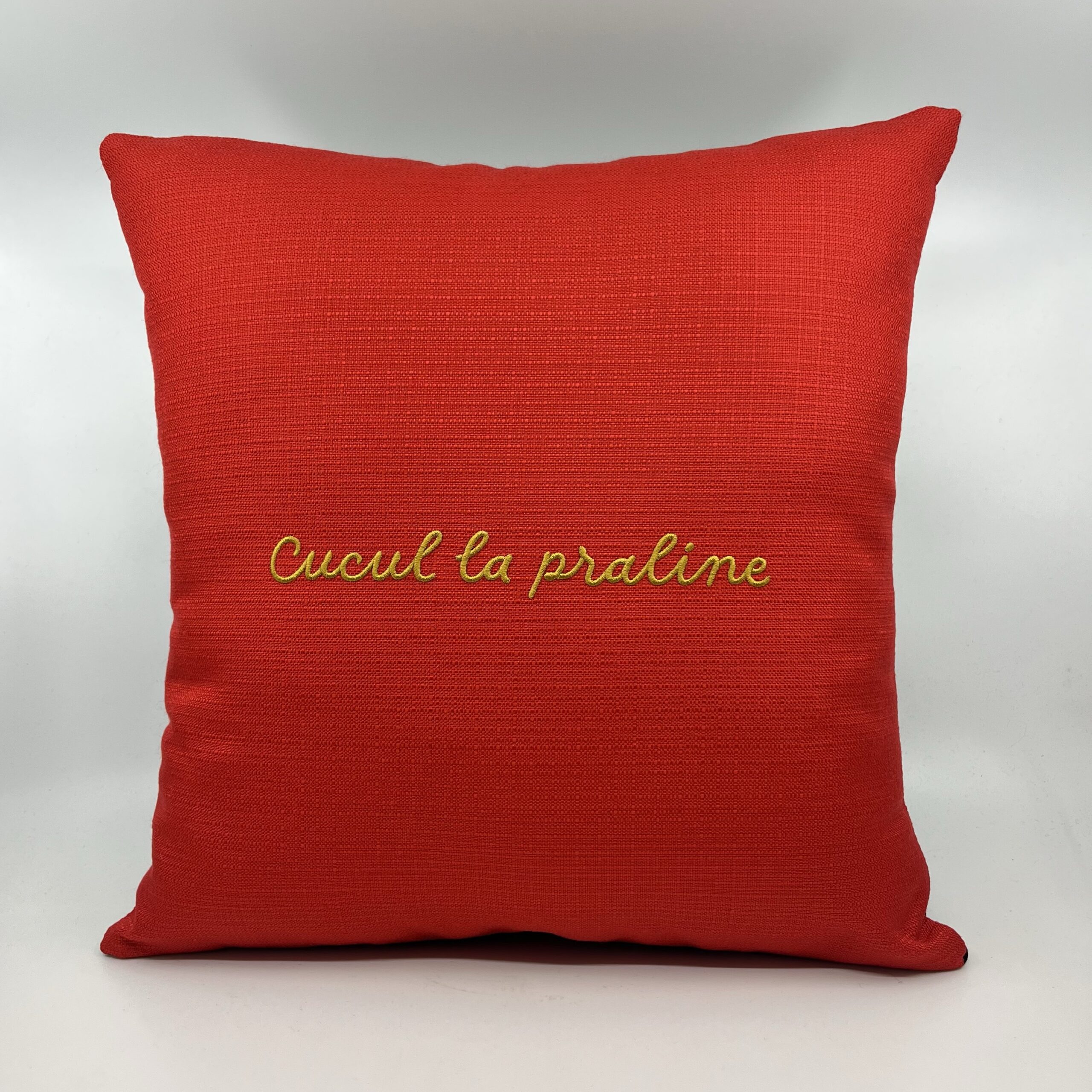Coussin, « Cucul la praline » Toile rouge vermillon
