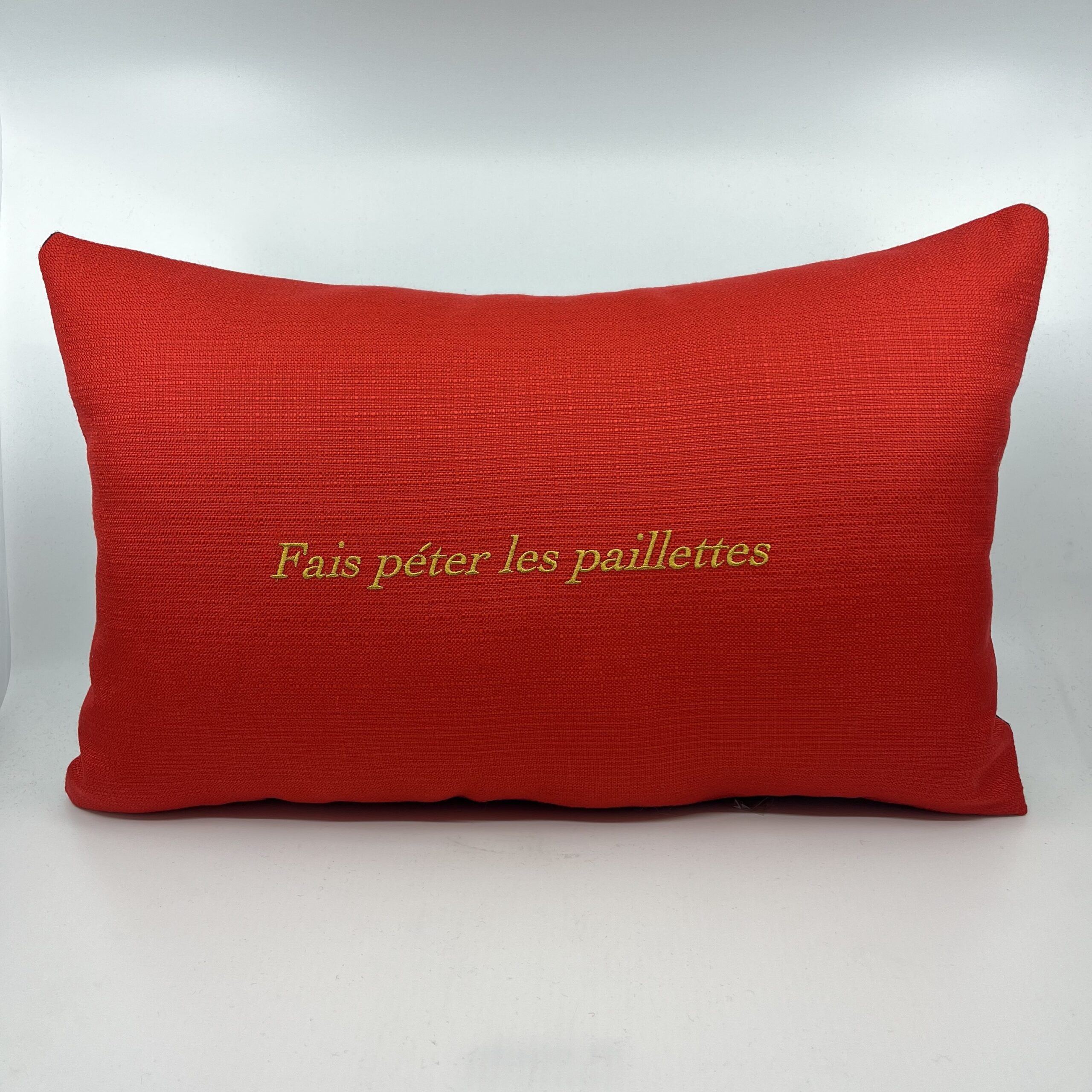 Coussin, « Fais péter les paillettes » Toile rouge vermillon