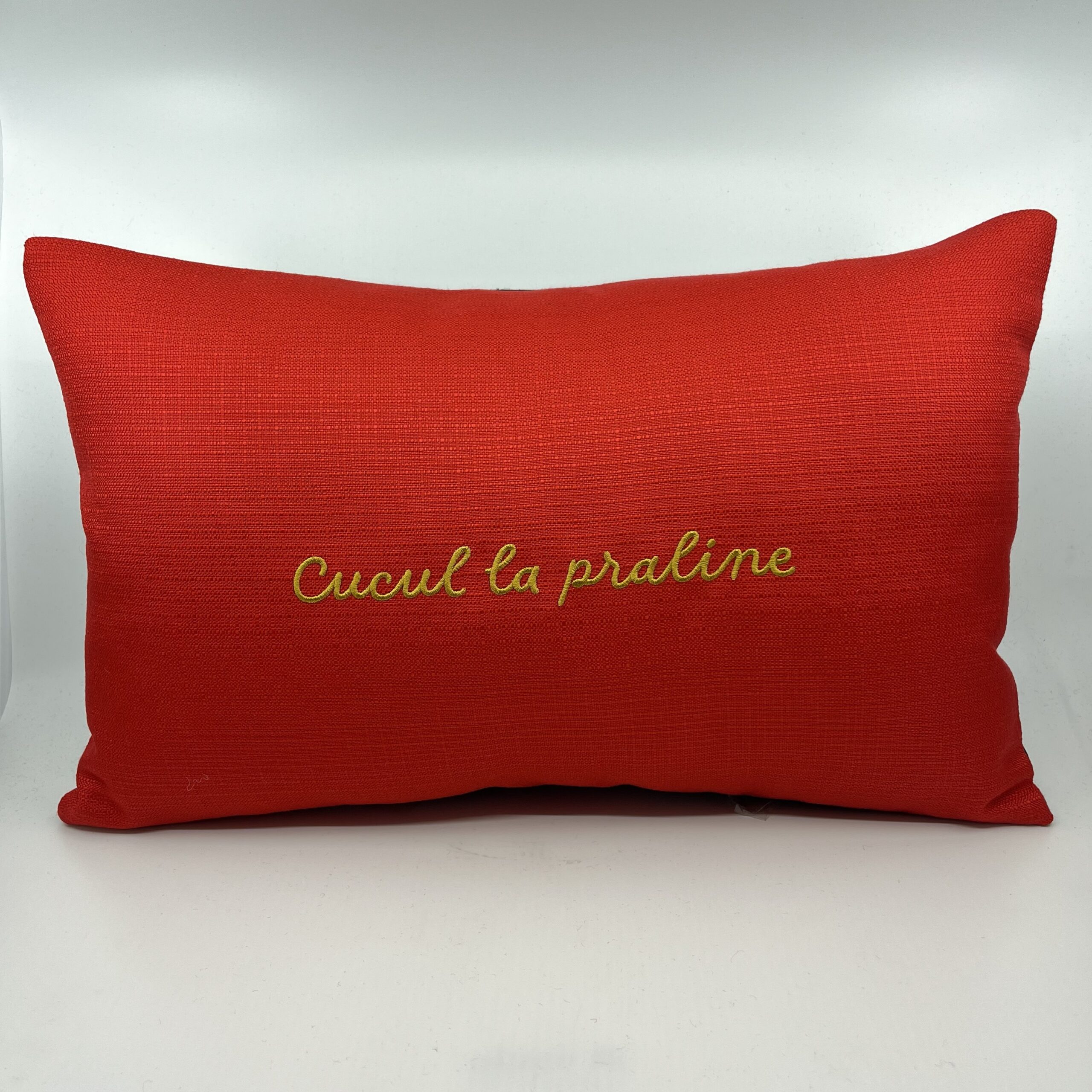 Coussin, « Cucul la praline » Toile rouge vermillon