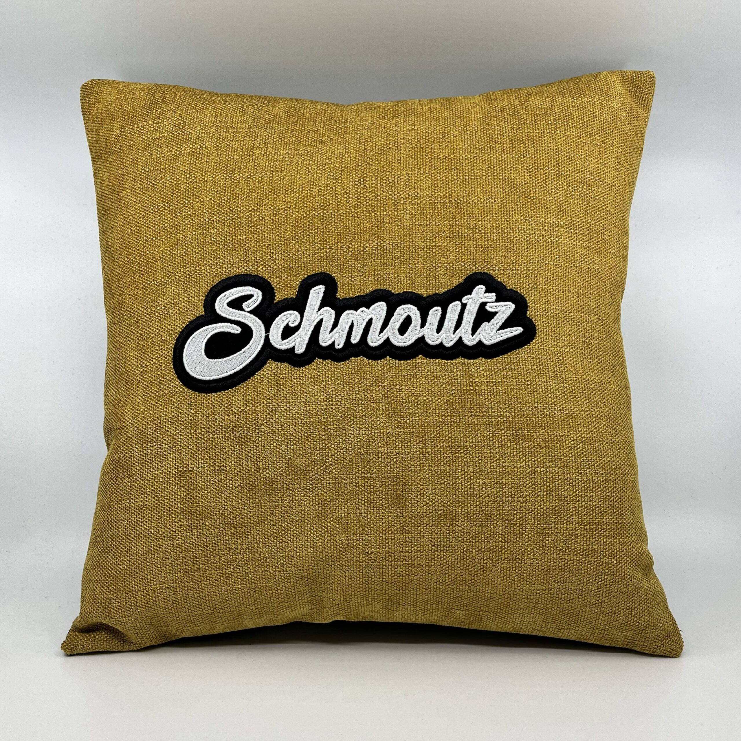 Coussin Schmoutz,
Toile jaune d’Or