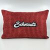 Coussin Schmoutz,
Velours côtelé rouge.