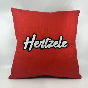 Coussin Hertzele,
Toile rouge.