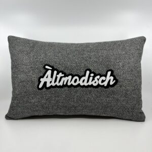 Coussin Àltmodisch,
Lainage gris.