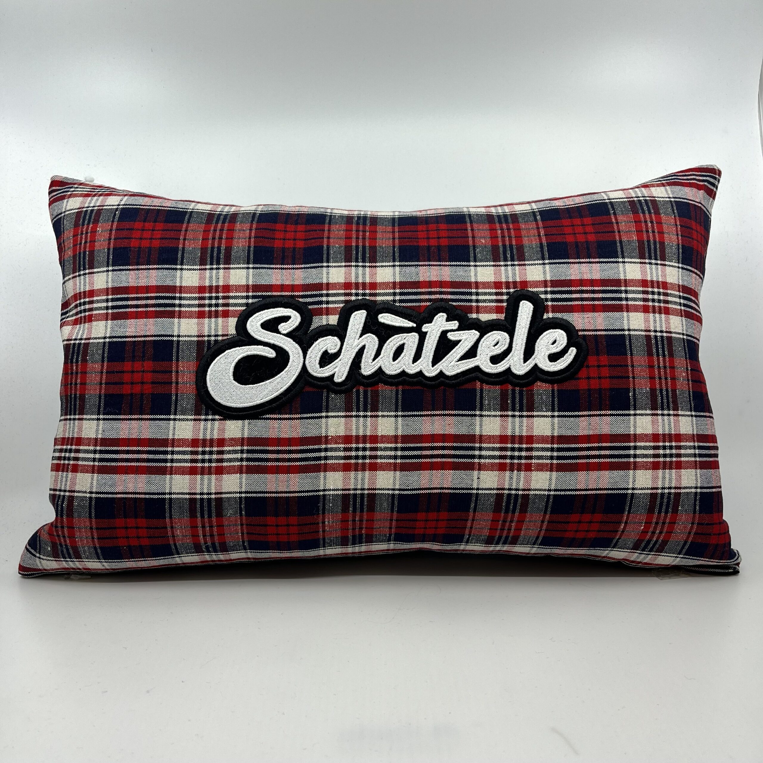 Coussin Schàtzele, Kelsch bleu et rouge.