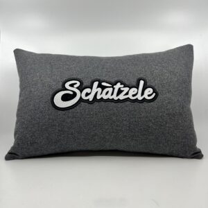 Coussin Schàtzele, lainage gris.