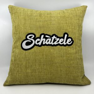 Coussin Schàtzele, velours vert.