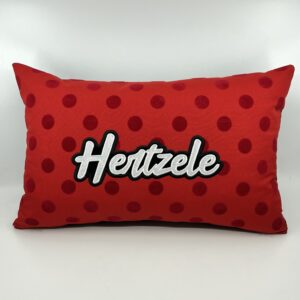 Coussin Hertzele, toile rouge à pois velours.