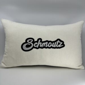 Coussin Schmoutz, velours côtelé blanc.