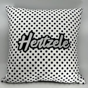 Coussin Hertzele, coton blanc-pois bleus marine.