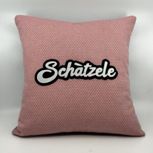 Coussin Schàtzele, 
Toile rose.