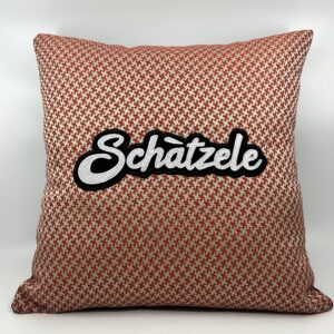 Coussin Schàtzele, 
Motifs corail.