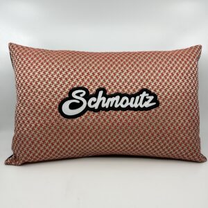 Coussin Schmoutz,
Motifs pieds de Poule corail.