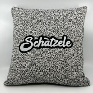 Coussin Schàtzele,
Lainage coton gris.