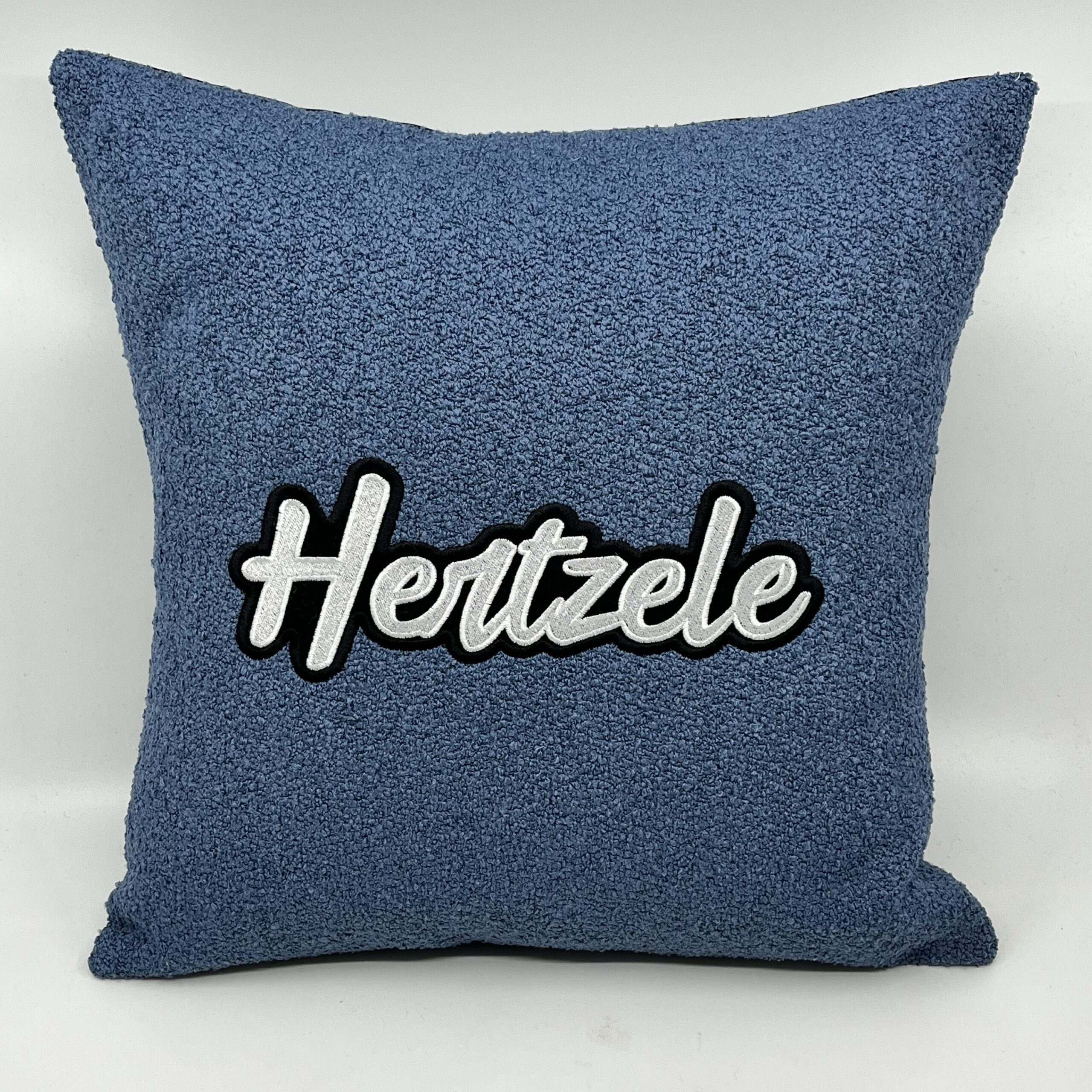 Coussin Hertzele,
Bouclette bleue